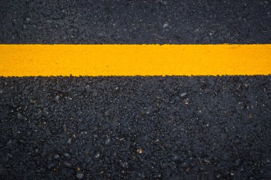 New asphalt texture with yellow line clipart