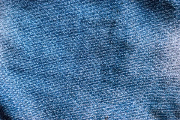 蓝色斜纹斜纹棉布牛仔裤背景特写剪贴图 — 图库照片