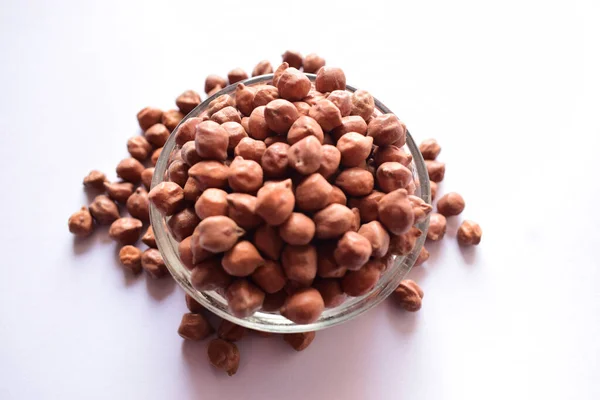 Top View Closeup Brown Chickpea Beans Transparent Glass Bowl Απομονωμένο — Φωτογραφία Αρχείου