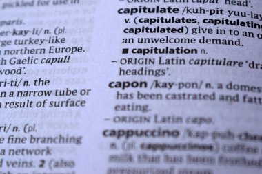 English Dictionary Page Print Close Up With The Word Meaning Of -capitulated