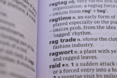 English Dictionary Book Page Close Up With The Word Transcription Of -ragwort