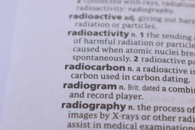 English Dictionary Book Page Close Up With The Word Transcription Of -radiogram