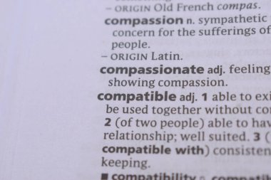 Definition Of English Dictionary Close Up Of Word -  compassionate