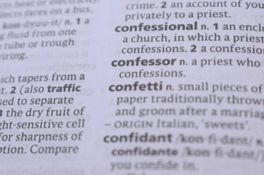 English Dictionary Book Page Close Up With The Word Transcription Of -confessor