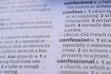 Close Up English Dictionary Page With The Word Reference Of - confession