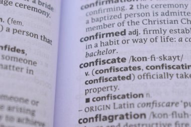 Close Up Of English Explanation Dictionary Word Of - confiscate