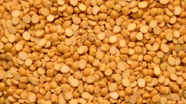 Chana Dal Dönen Üst Görünüm, Nohutları Böl Doku Yemek arkaplanı