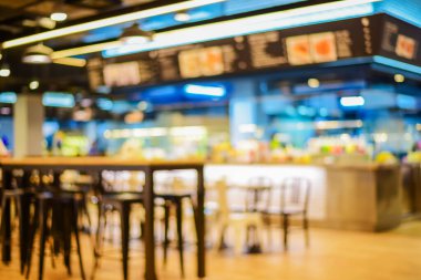 Vintage Tones ile yapılan soyut bulanık arkaplan, alışveriş merkezinin arka planında Bokeh ile yemek salonundaki müşteri.