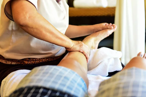 woman relaxing in the spa.Foot massage.Woman enjoying during a relax massage at the spa.