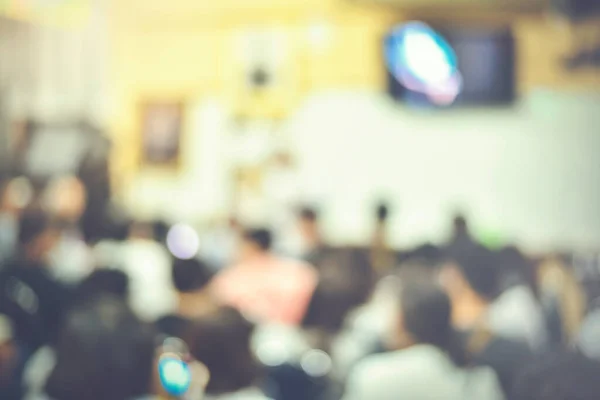 Abstract blur of Business Meeting background. Audience in the conference hall. Business and Entrepreneurship.Bright blue toning.Copy space