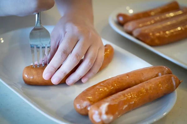 Close Hands Use Fork Puncturing Homemade Sausage Prepare Family Party — стоковое фото