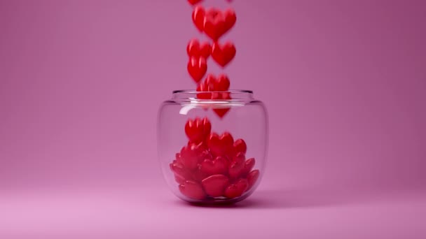 Koncepcja Animacji Walentynkowej Czerwone Serca Spadające Szklanym Słoiku Różowym Tle — Wideo stockowe