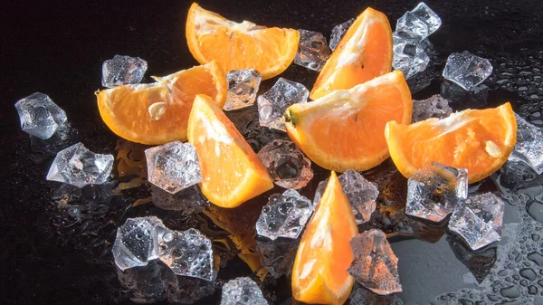 Tangerine Slices Ice Drops Black Background Close Background Template Still — 스톡 사진