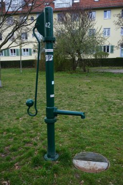 Metal water column. Mahlsdorfer Str. 97a, Berlin, Germany 