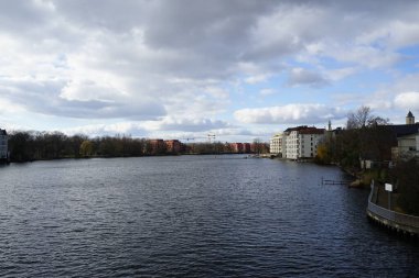 View of the confluence of the Dahme and Spree rivers from the Dammbruecke bridge in February. Berlin, Germany, Europe. 