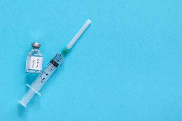 Fles Met Vaccin Spuit Met Vaccin Blauwe Achtergrond Begrip Vaccinatie — Stockfoto