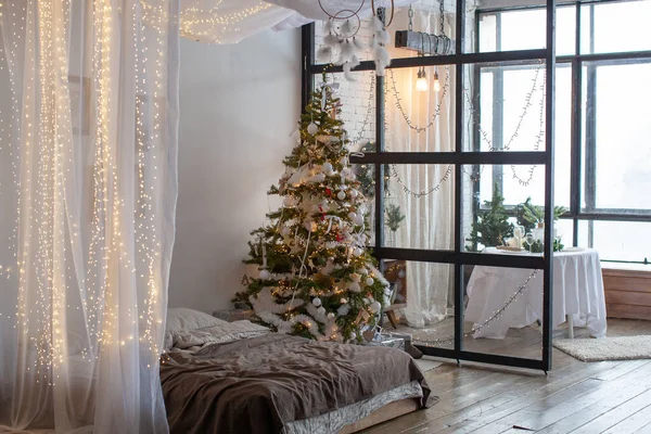 Christmas interior with bed. — Stock Photo, Image