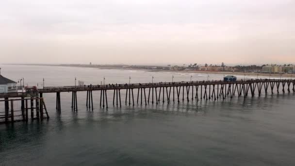 Drone circles around Imperial Beach pier in San Diego, California — Stock Video