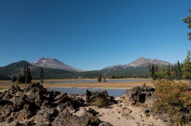 Sparks Lake near Bend Oregon in summer low water level clipart