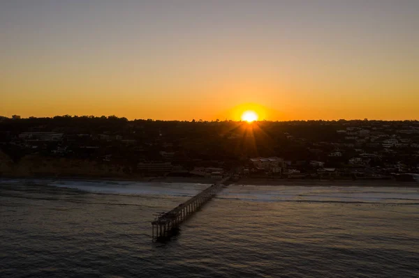 Beautiful sunrise with sun star behind Scripps Pier — Stock Photo, Image