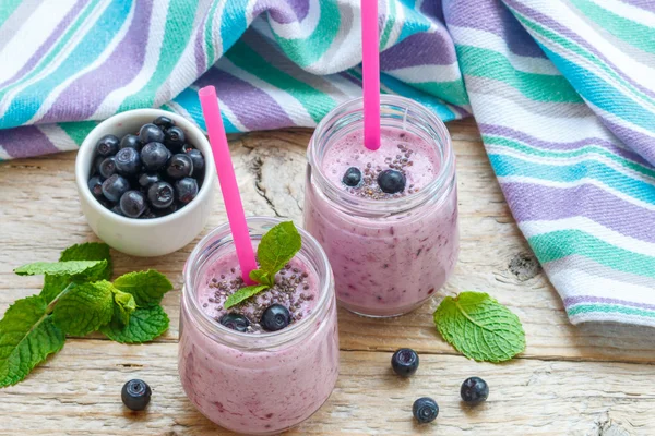 Healthy Breakfast. Summer dessert. Smoothies with homemade yoghurt, blueberries and Chia seeds. Selective focus