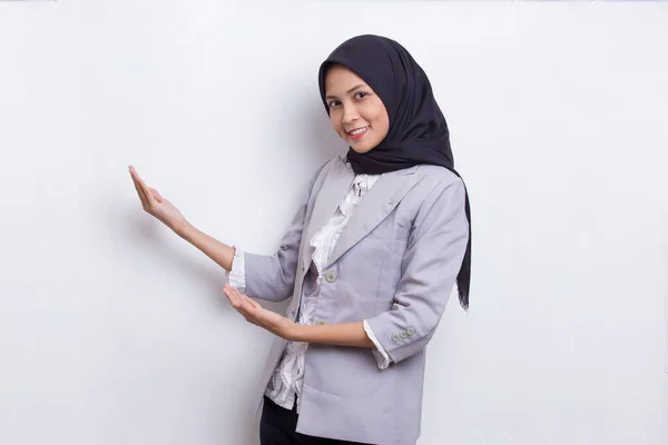 Happy Young Asian Muslim Woman Pointing Fingers Different Directions Isolated — Stok Foto