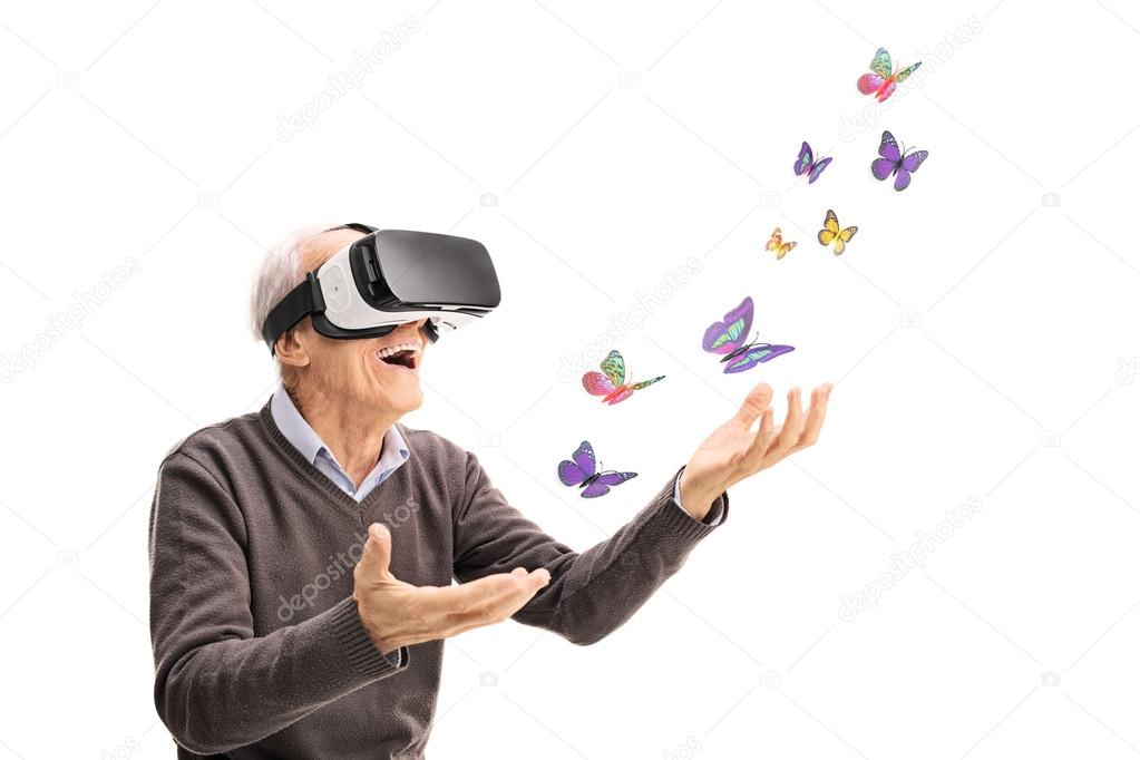 Senior visualizing butterflies via VR headset