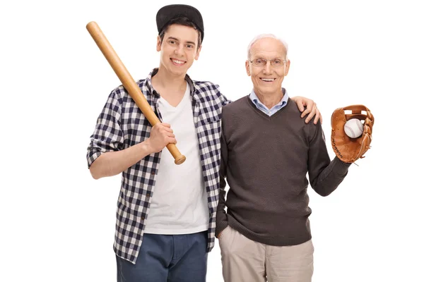 Father and son posing with baseball equipment — Stock Photo, Image