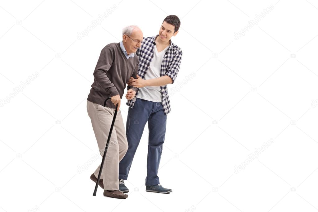 Young man helping a senior gentleman 