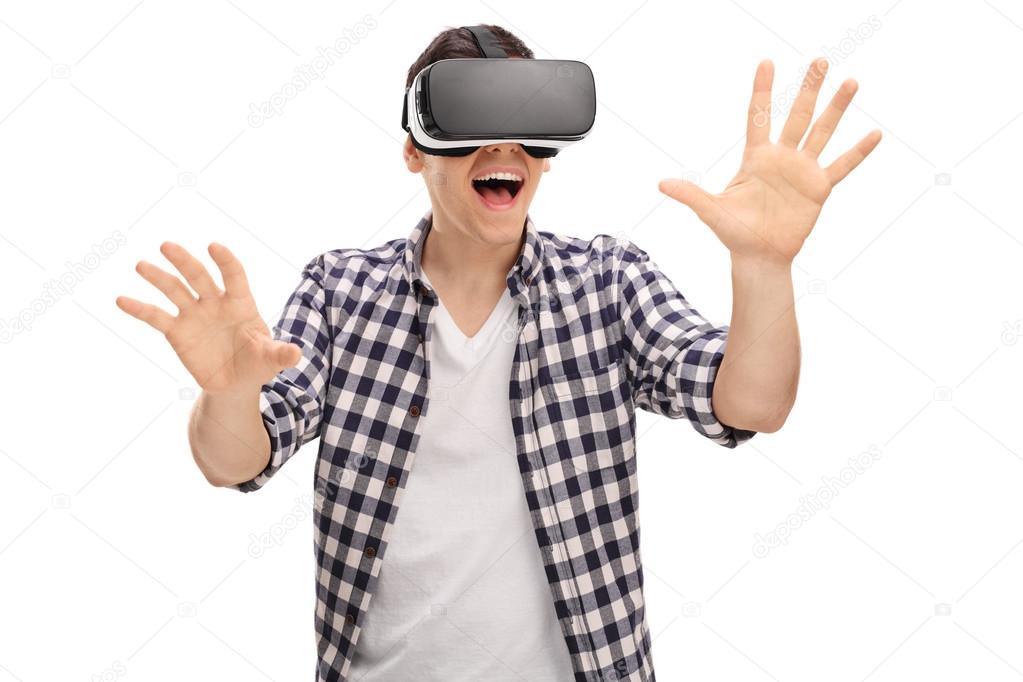 Excited man experiencing virtual reality 