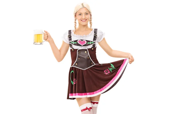 Woman in Bavarian costume holding beer — Stock Photo, Image