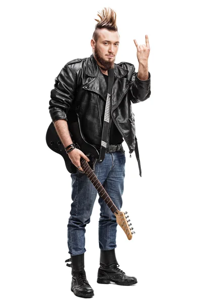 Punk rocker making a hardcore hand gesture — Stock Photo, Image