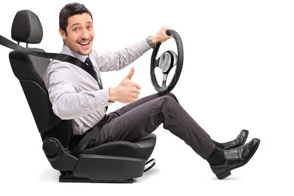 Guy driving and giving a thumb up — Stock Photo, Image