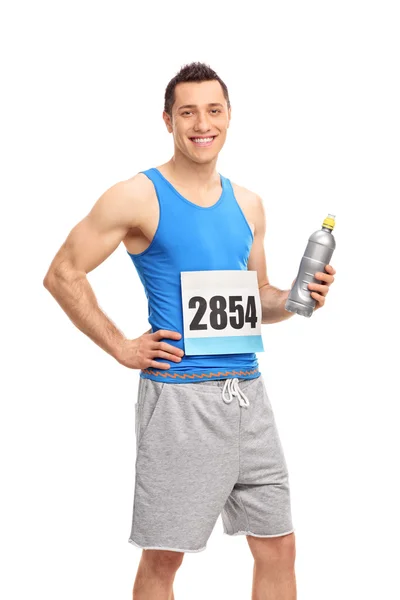 Male runner athlete with water bottle — Stock Photo, Image