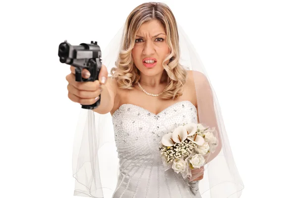Desperate young bride holding a gun — Stock Photo, Image