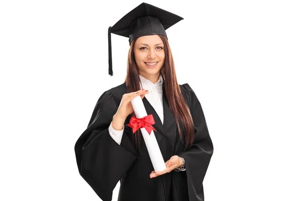 Female graduate student holding a diploma — Stock Photo, Image