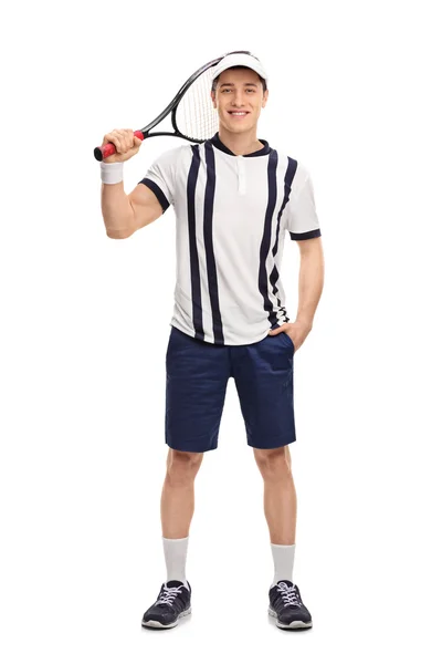 Junge Tennisspielerin hält Schläger in der Hand — Stockfoto