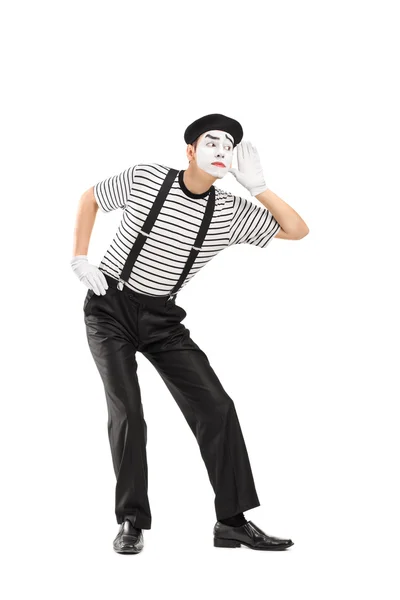 Mannelijke MIME-kunstenaar probeert om iets te horen — Stockfoto