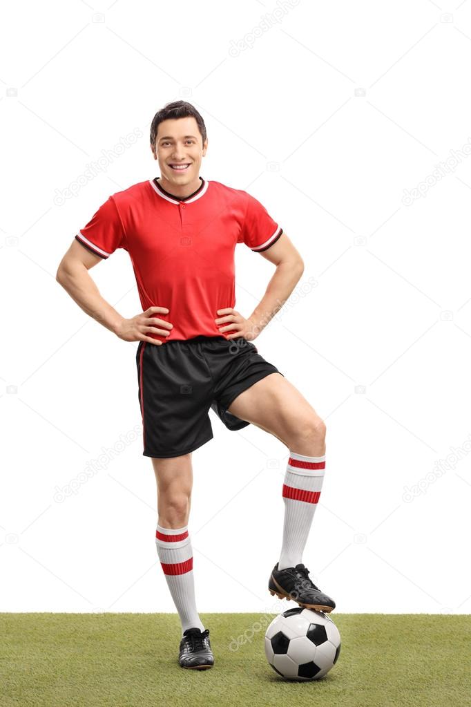 Soccer player stepping over a ball Stock Photo by ©ljsphotography 106575324