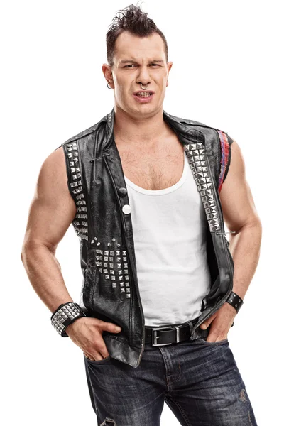 Punker with an old leather jacket with pins — Stock Photo, Image