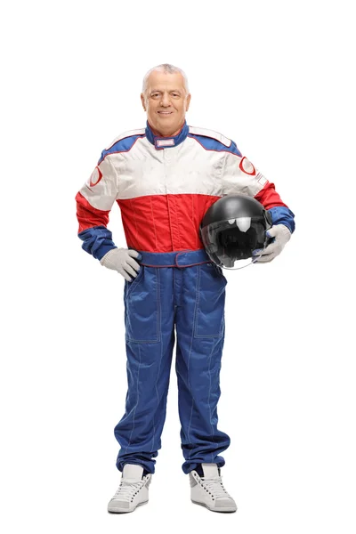 Mature man in racing suit holding helmet — Stock Photo, Image