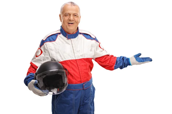 Mature car racer gesturing with his hand — Stock Photo, Image