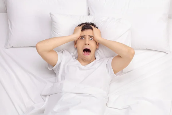 Frustrated man unable to get some sleep — Stock Photo, Image