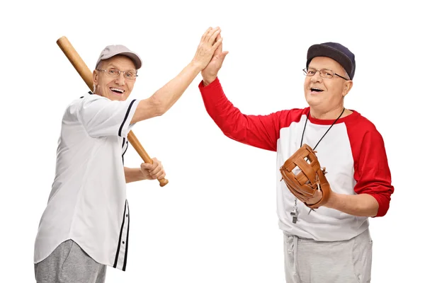 Senior men high-five each other — Stock Photo, Image