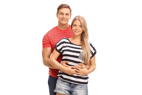Junger Mann umarmt seine Freundin — Stockfoto