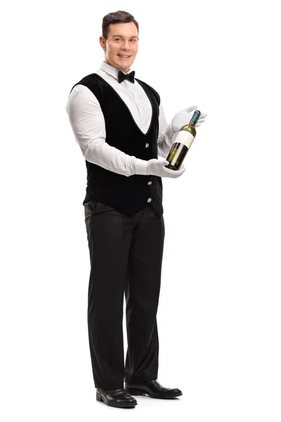 Číšníku, drží láhev bílého vína — Stock fotografie