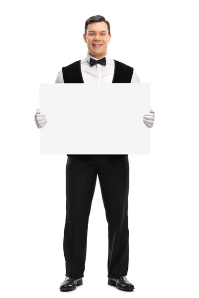 Butler segurando um banco placa branca — Fotografia de Stock