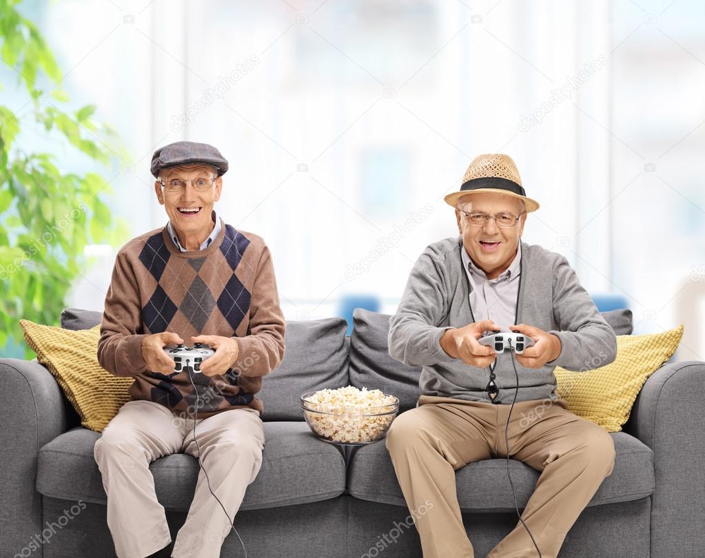 Senior Men Playing Video Games Stock Photo C Ljsphotography