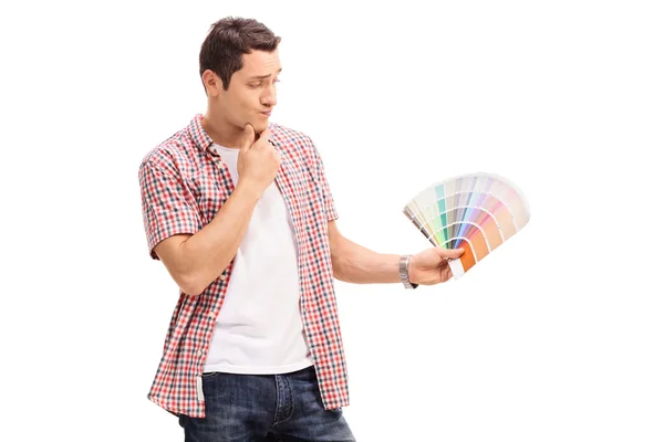 Man choosing color for renovation — Stock Photo, Image