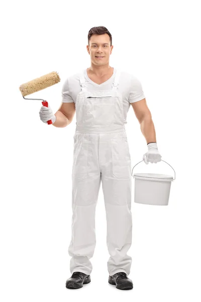 Decorator holding painting equipment — Stock Photo, Image